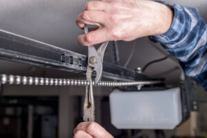 Person installing a new garage door opener